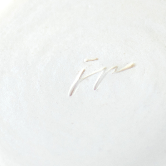 Kubek na kawę. Biały z zielono-żółtym kwiatem